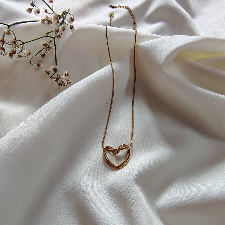 Gold Necklace with a Heart Pendant