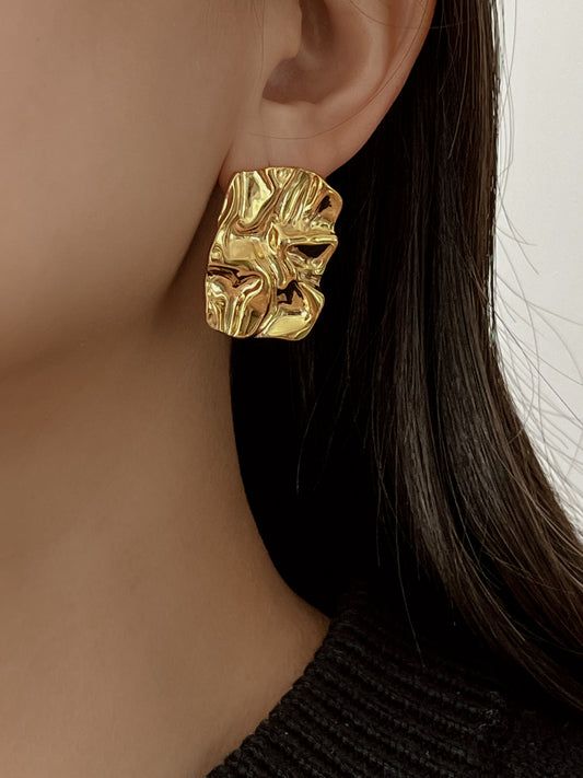 Pair of gold stud earrings