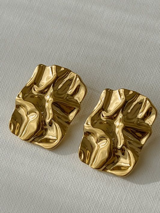 Pair of gold stud earrings
