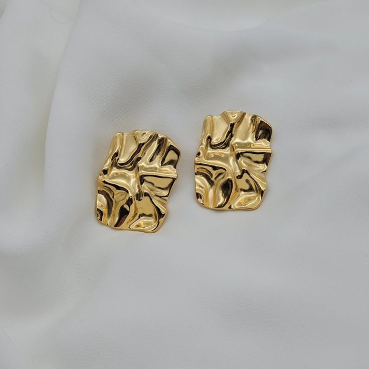 Pair of gold stud earrings