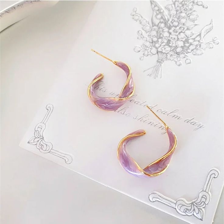 TWISTED HOOP EARRINGS
