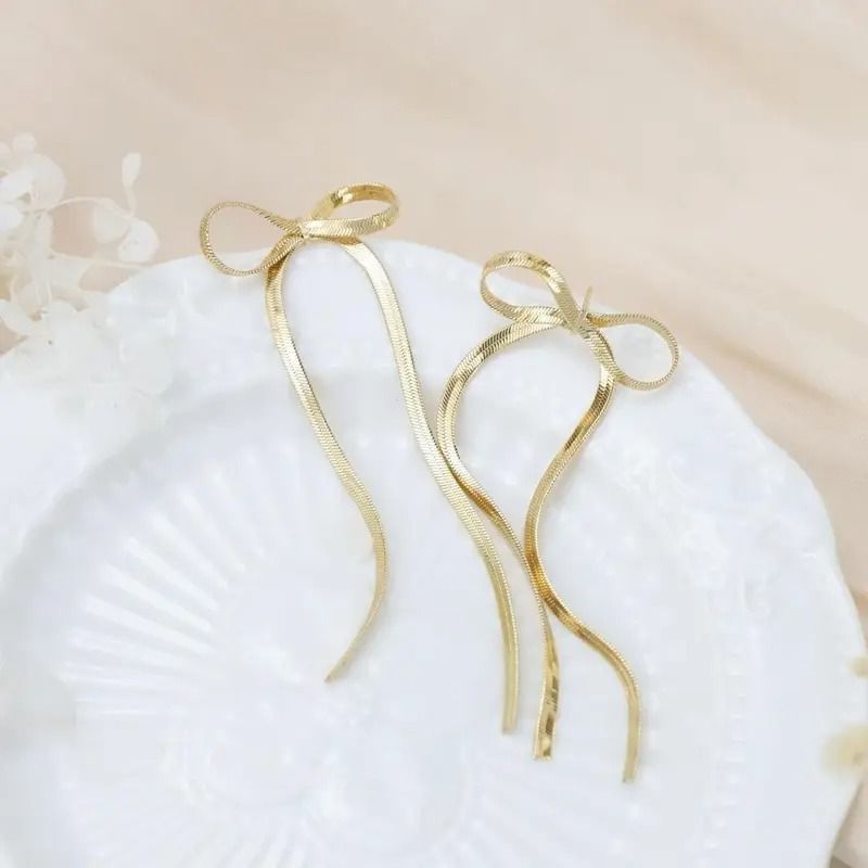 LONG TALE BOW EARRING